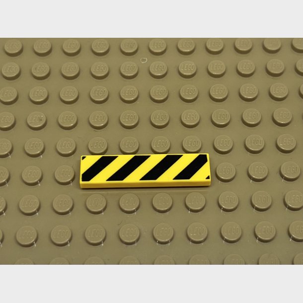 Tile 1x4 m/gule og sort advarsels striper. Lego nr. 2431pb426